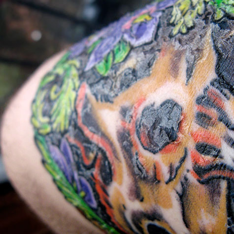 tattoo peeling. Peeling Triceratops tattoo